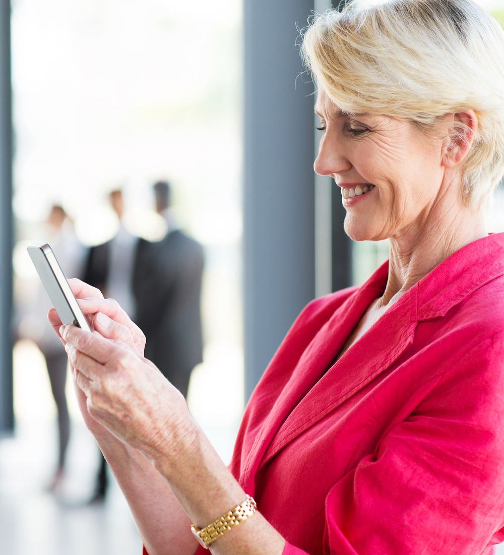 Business owner checking her listing on a phone